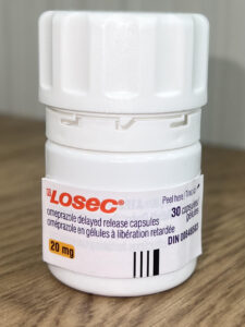 Losec omeprazole capsules for GERD and acid reflux relief
